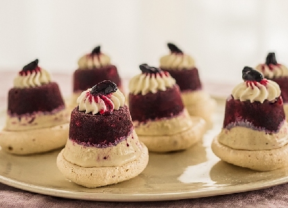 Vacherin Bites with Haskap Berries.